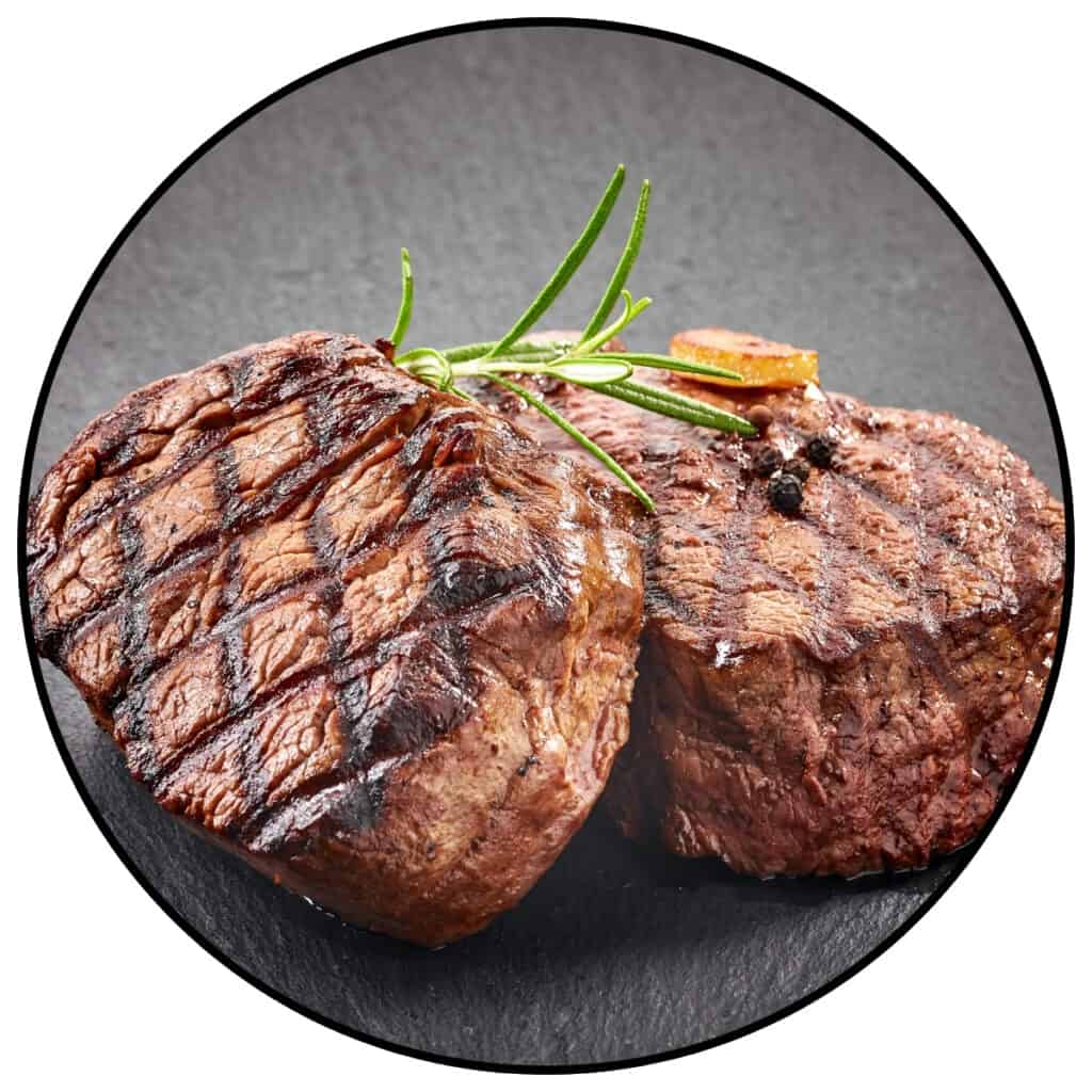 Photo of a piece of cooked beef within a circle frame for a post about beef jokes and beef puns.